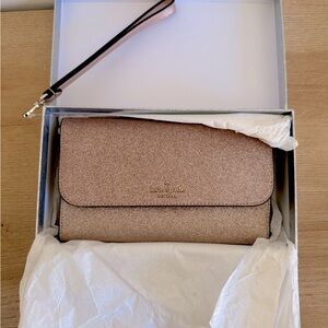 Kate spade rose gold wristlet wallet
